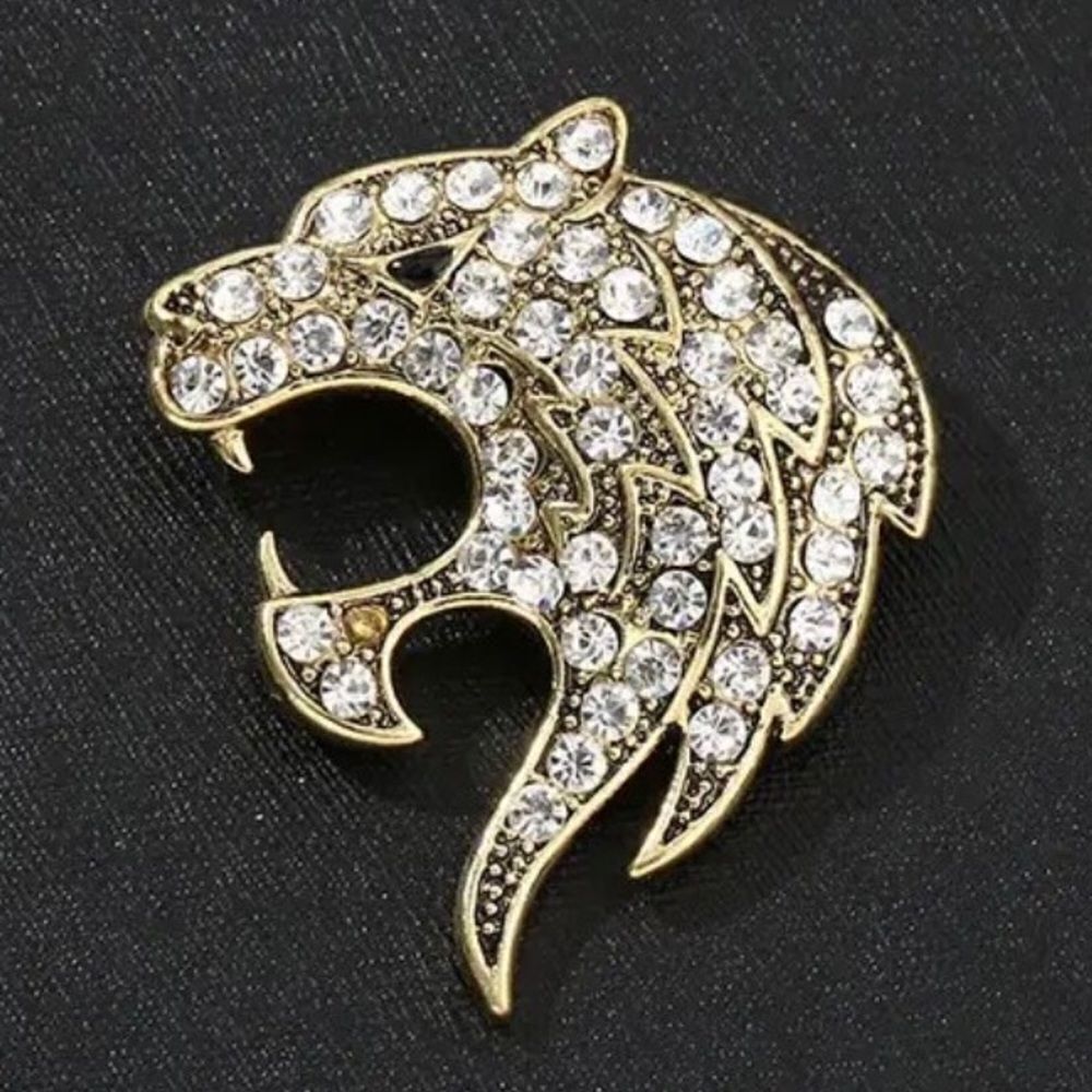 GOLDTONE AND CLEAR TIGER BROOCH‎